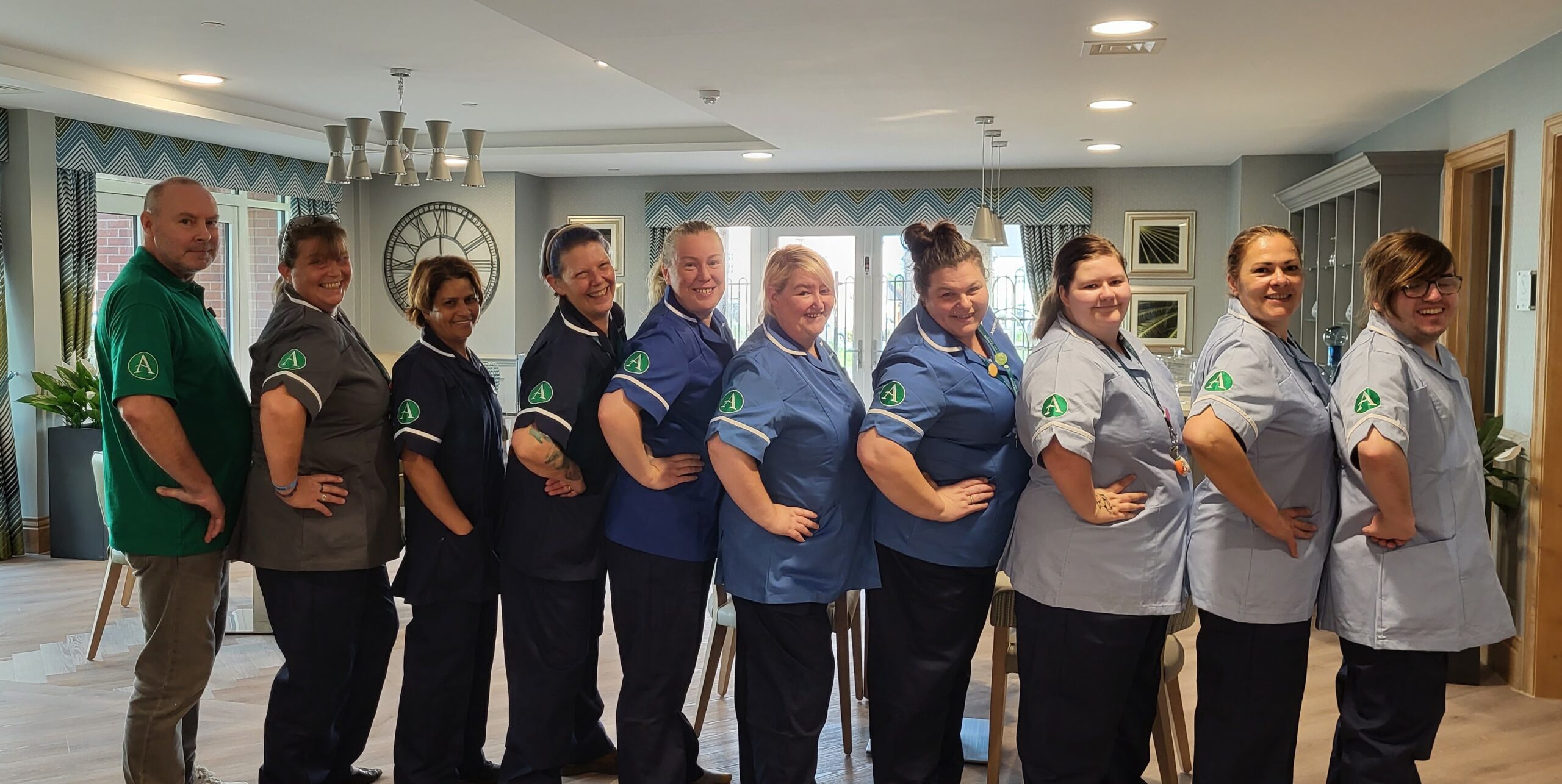 Staff at Alexander House in their uniforms